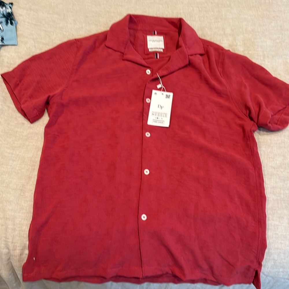 Men’s button down shirt, medium, never worn. Runs small